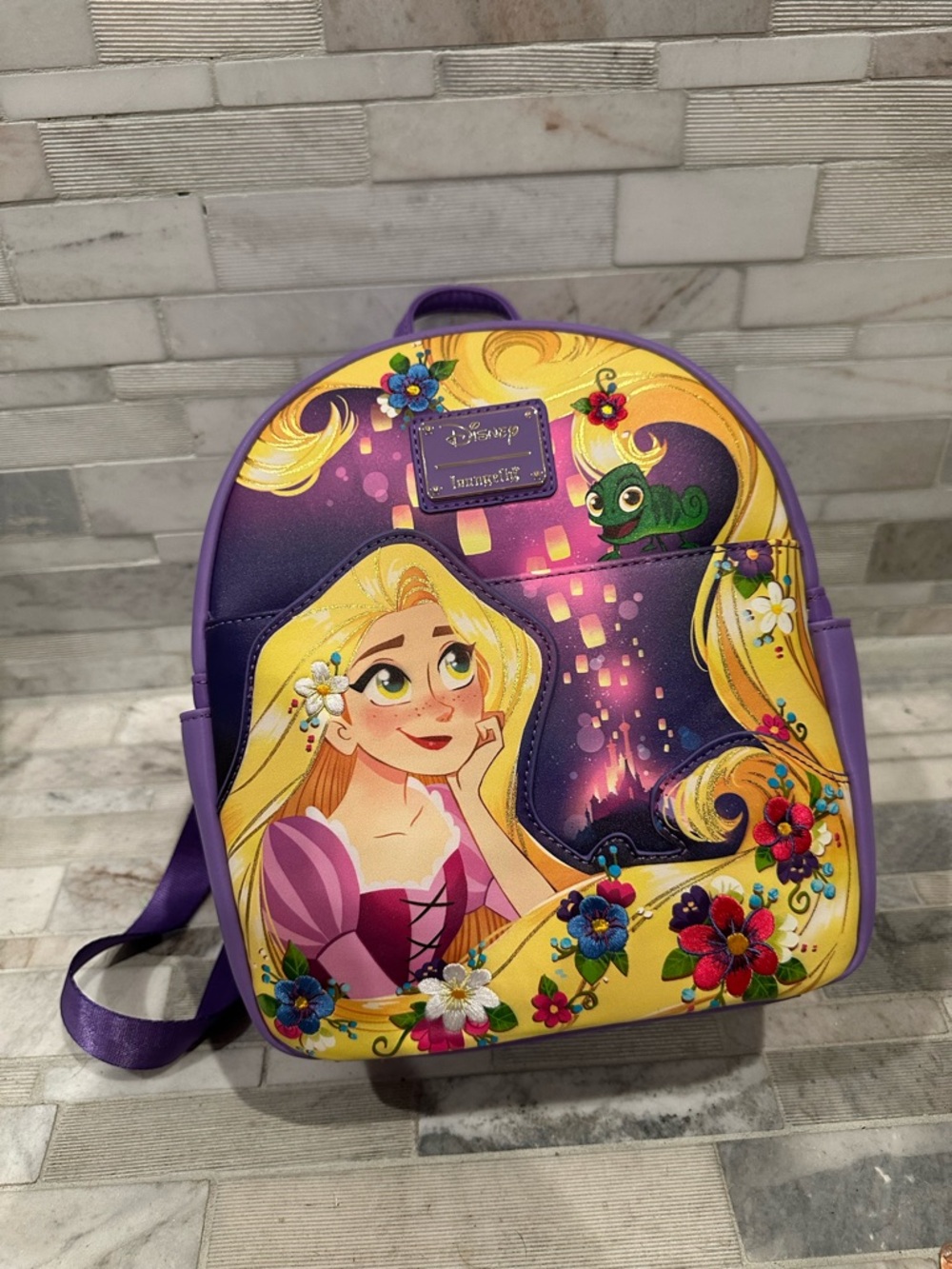 Loungefly Rapunzel Illustrated Purple and Yellow Mini Backpack